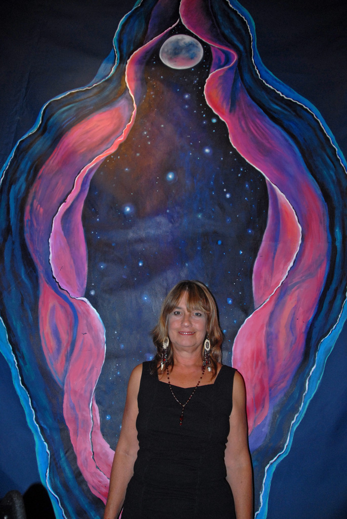 The Cosmic Mother backdrop, Acrylic on vinyl, 8’x10’ with Amarah Gabriel. Photo by Derrick Lundy, Driftwood newspaper