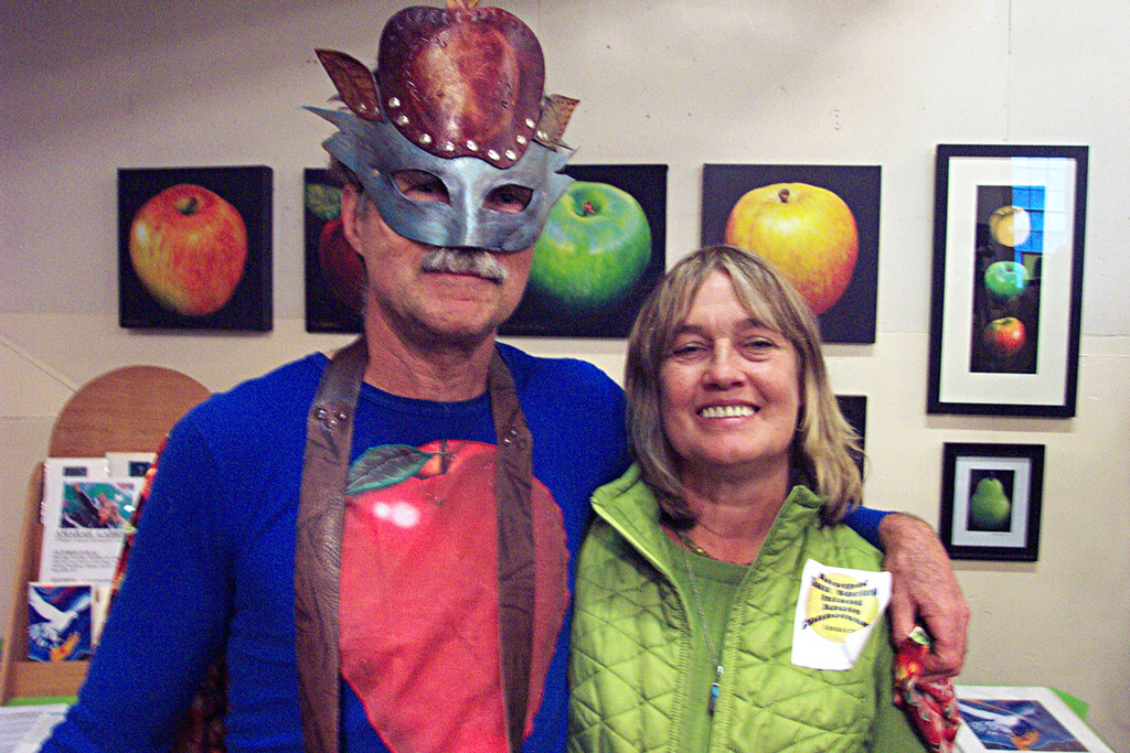 ‘Captain Apple’ Harry Burton, creator of the Apple Festival and Amarah Gabriel with art display