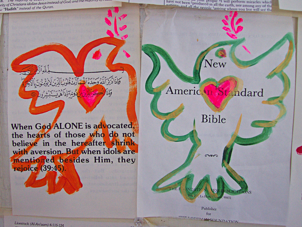 Peace Doves, Acrylic on Quran and Bible pages 12”x9” 2006