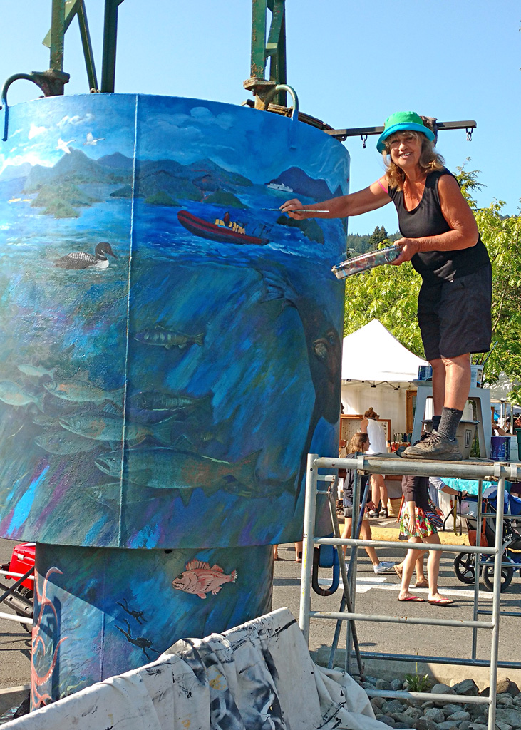 Landmark Mural repainting - A decommissioned marine buoy, Harbour Authority, Ganges, Salt Spring Island 2016