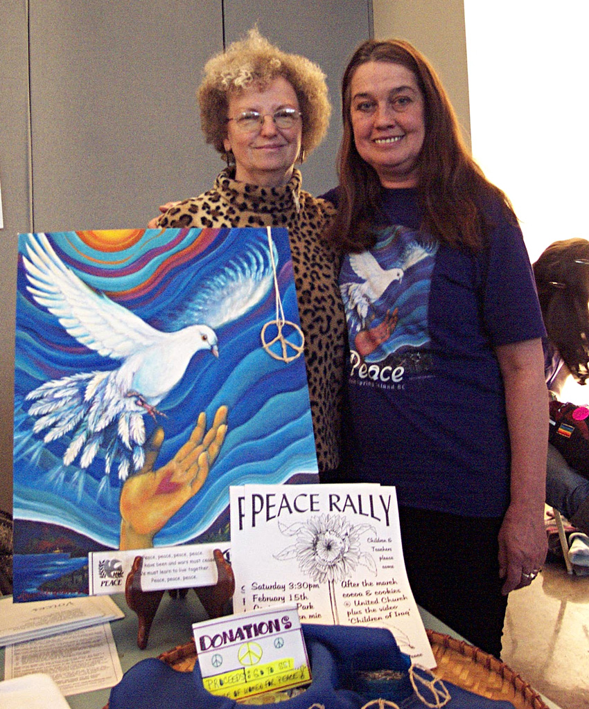 Voice of Women National Peace Conference, Marion Pape and Amarah Gabriel with painting and t-shirt created for event.